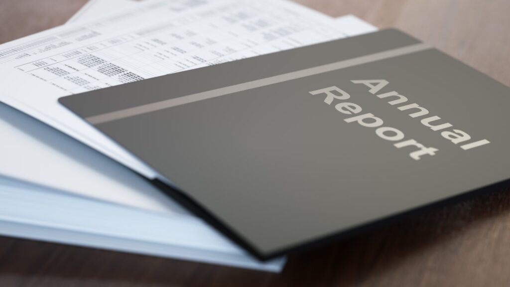 Annual report folders with paper close-up