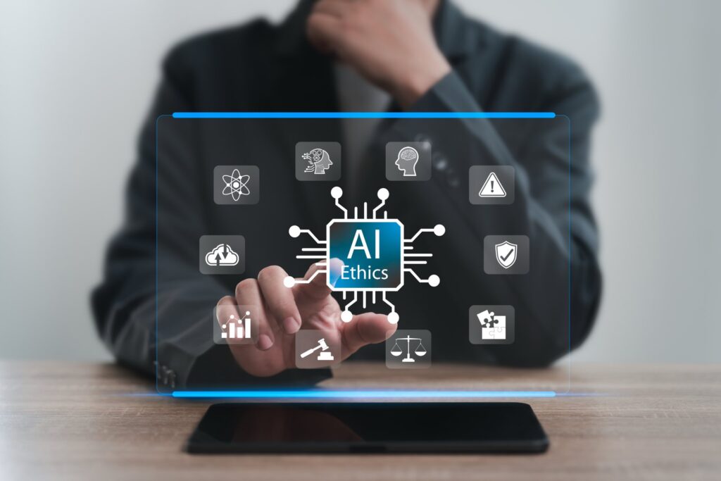 Person touching a screen that says AI Ethichs